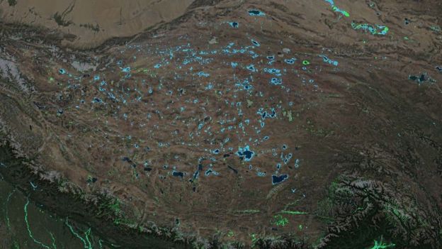 New lakes - seen as blue pixels - are appearing on the Tibetan Plateau.