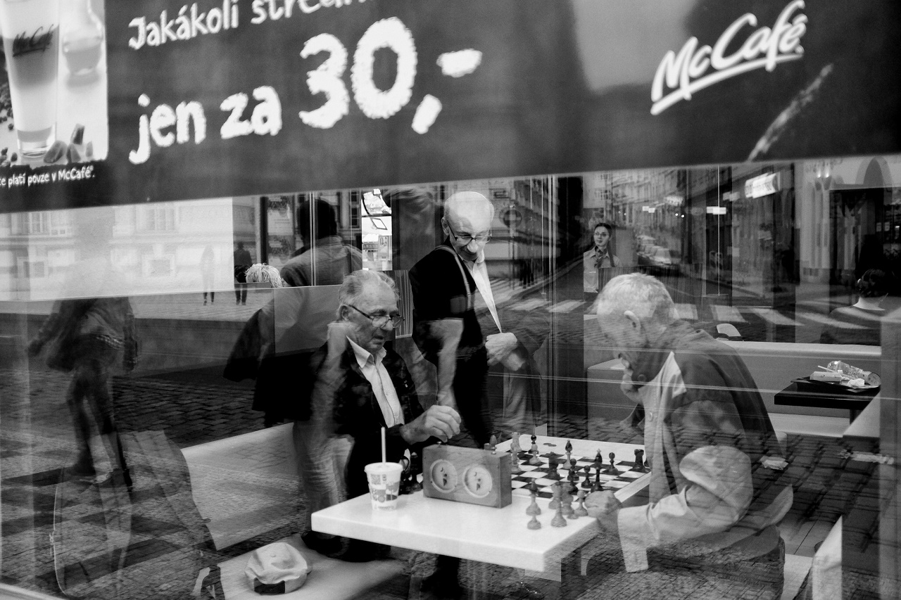 Elderly chess players. Photo credit: Petr Dosek / Flickr