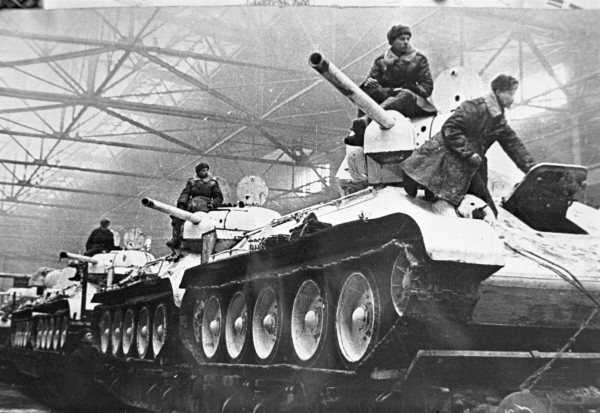 Newly built T-34 tanks being prepared for rail transport to Eastern Europe, Uralmash production facility, Sverdlovsk, Russia, 1 Feb 1942.