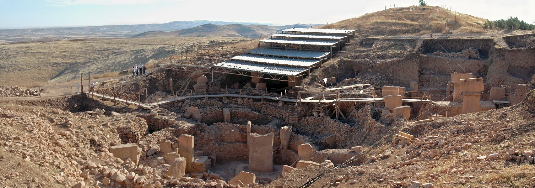  Göbekli Tepe (Turkey): a panoramic view of the southern excavation field. Creative Commons. Credit to Wikipedia user Rolfcosar.