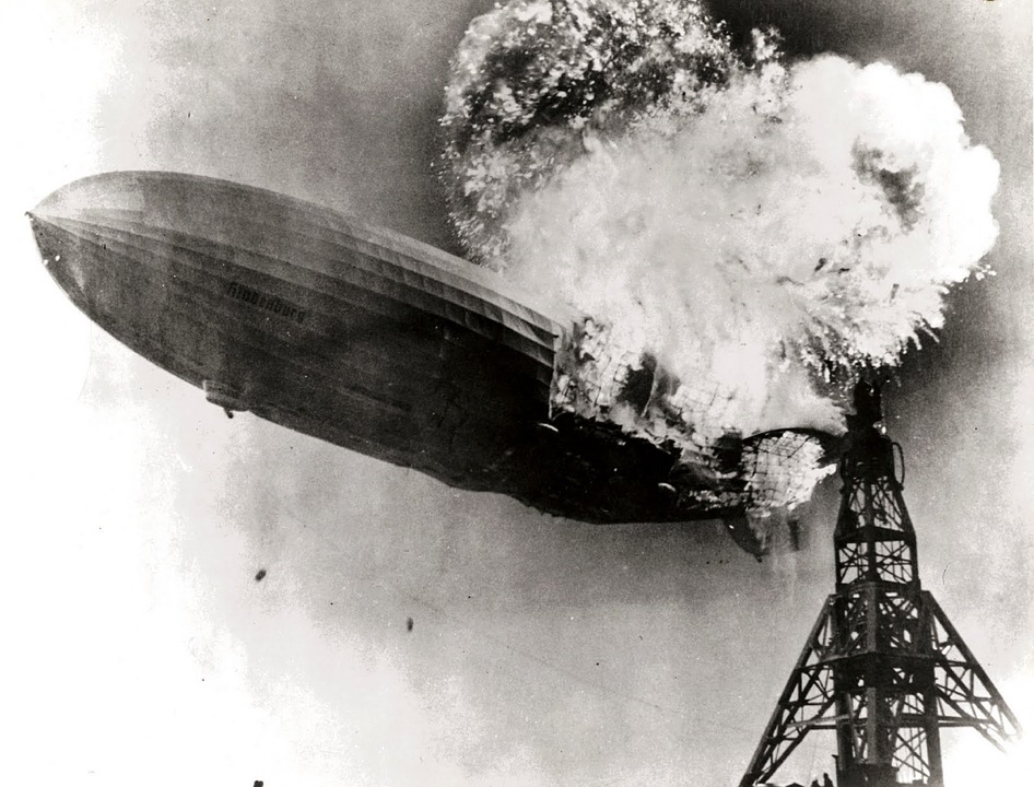 The German passenger airship LZ 129 Hindenburg caught fire and was destroyed during its attempt to dock with its mooring mast at Naval Air Station Lakehurst. On board were 97 people (36 passengers and 61 crewmen); there were 36 fatalities (13 passengers and 22 crewmen, 1 worker on the ground). The disaster was the subject of newsreel coverage, photographs, and Herbert Morrison's recorded radio eyewitness reports from the landing field, which were broadcast the next day.
